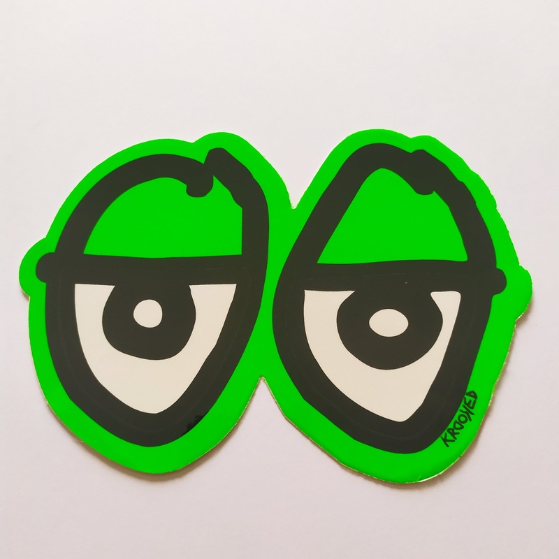 Krooked “Eyes” Skateboard Sticker – Green, 8.5cm